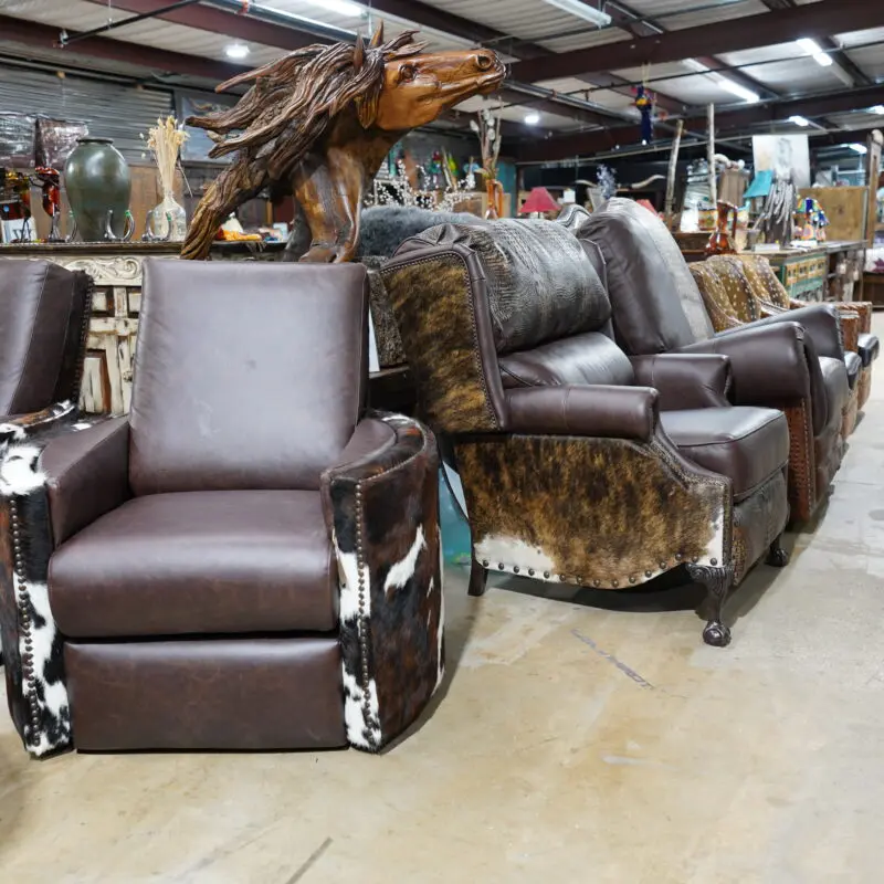 A room filled with lots of furniture and animal skins.