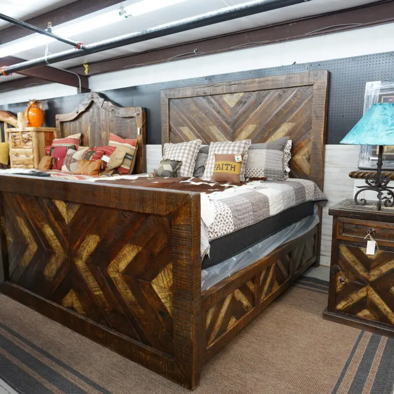 A bed and nightstand made of wood with a wooden pattern.