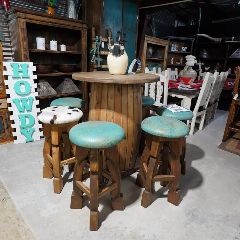 A table with four stools in the middle of it.