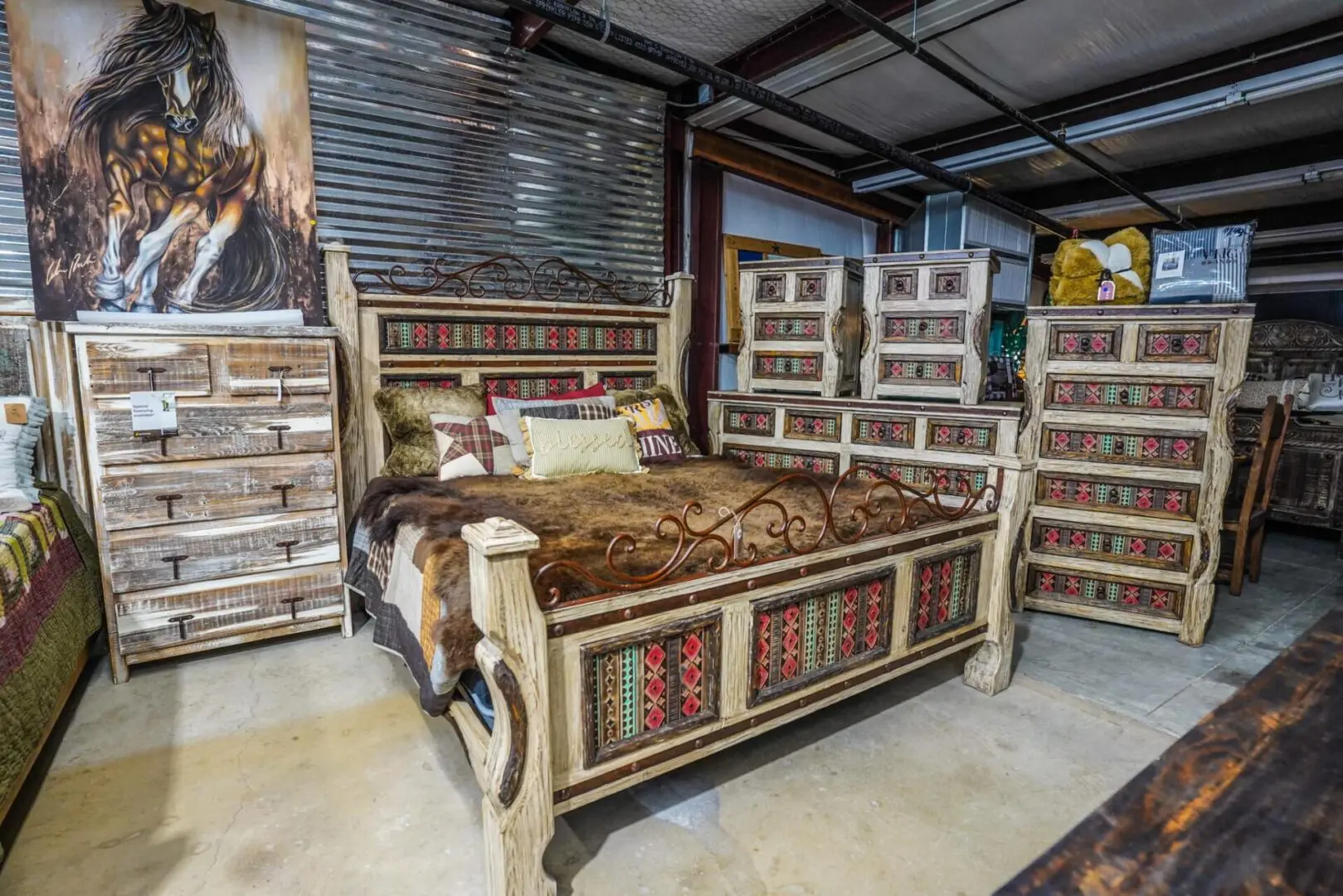 A bed room with a lot of furniture in it