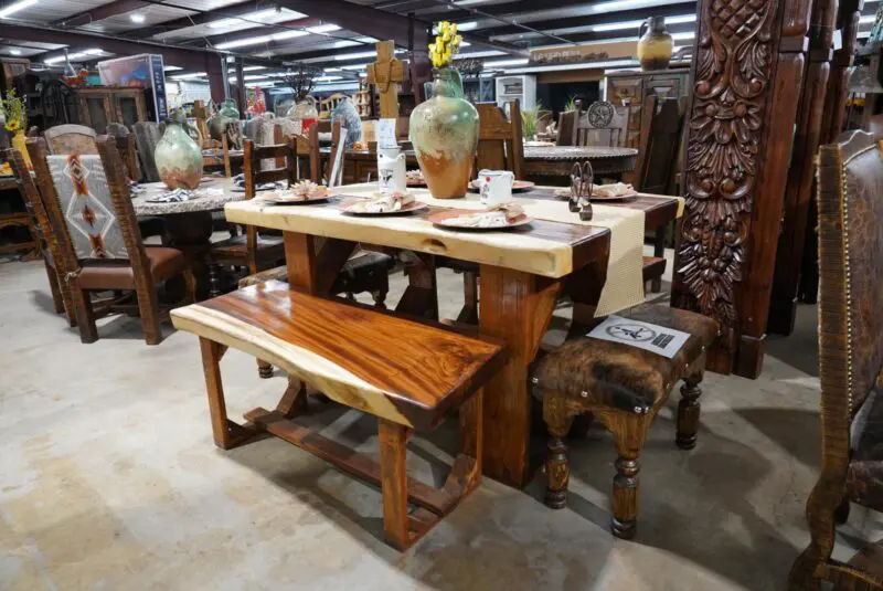 A room filled with wooden tables and chairs.