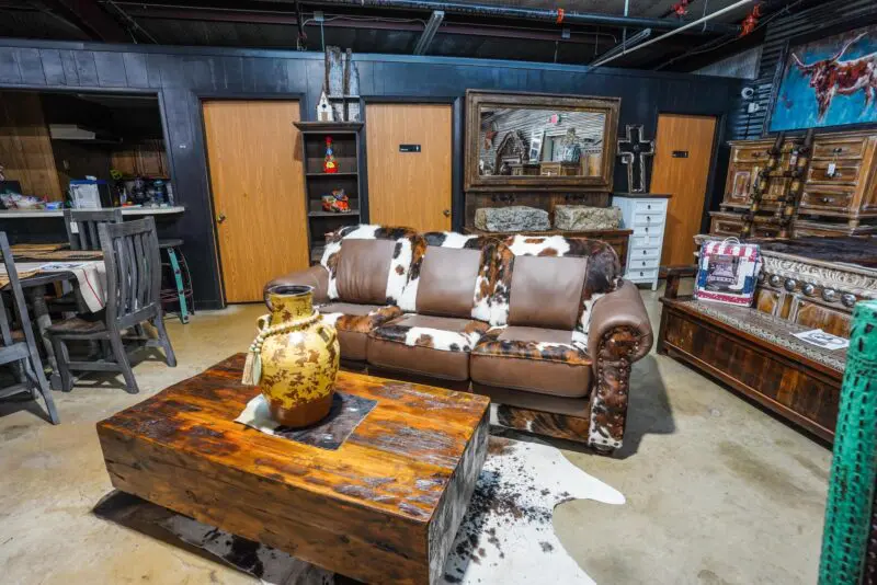 A living room with a couch and coffee table