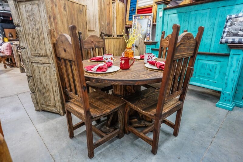 Rustic wooden dining table and chairs.