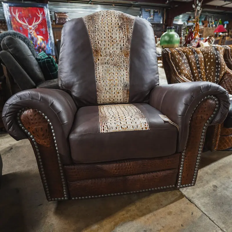 Brown leather recliner with alligator print.