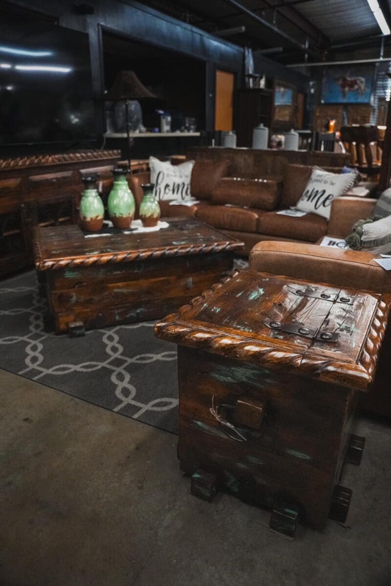 Rustic wooden coffee table with chests.